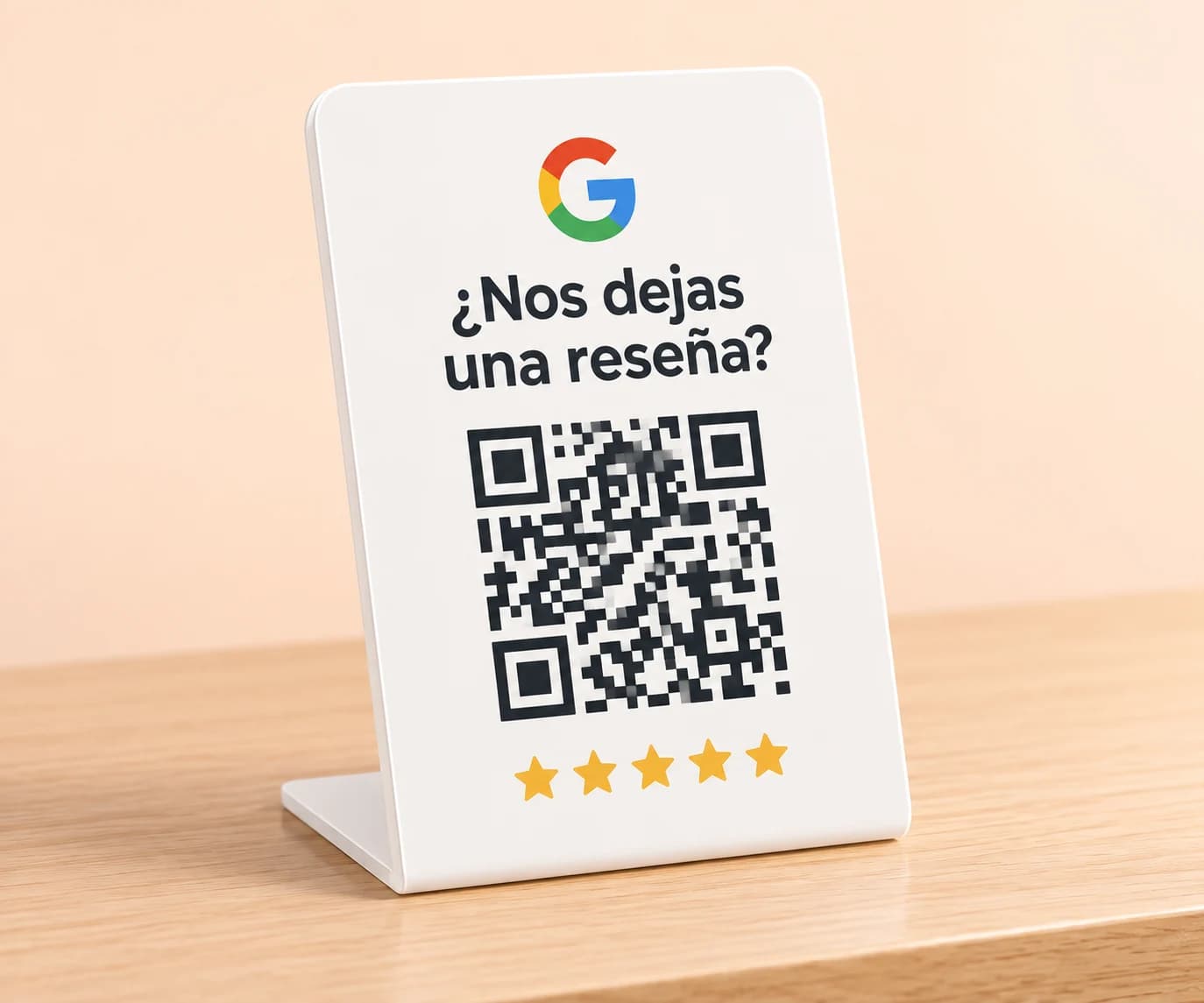 A freestanding countertop sign with a QR code for requesting Google reviews.