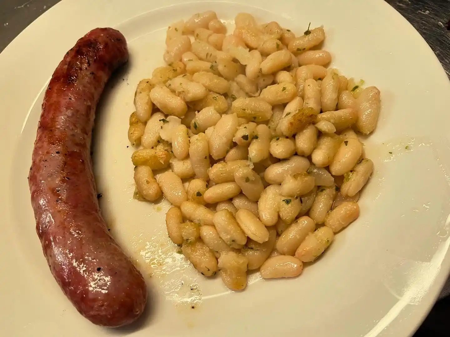 botifarra con mongetes blancas salteadas menu mediodia figueres restaurante eixample