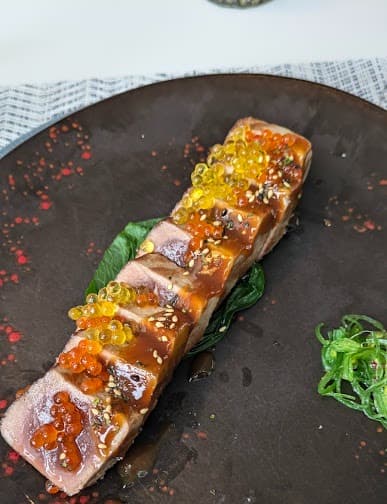 con huevas y salsa soja restaurante moderno Figueres