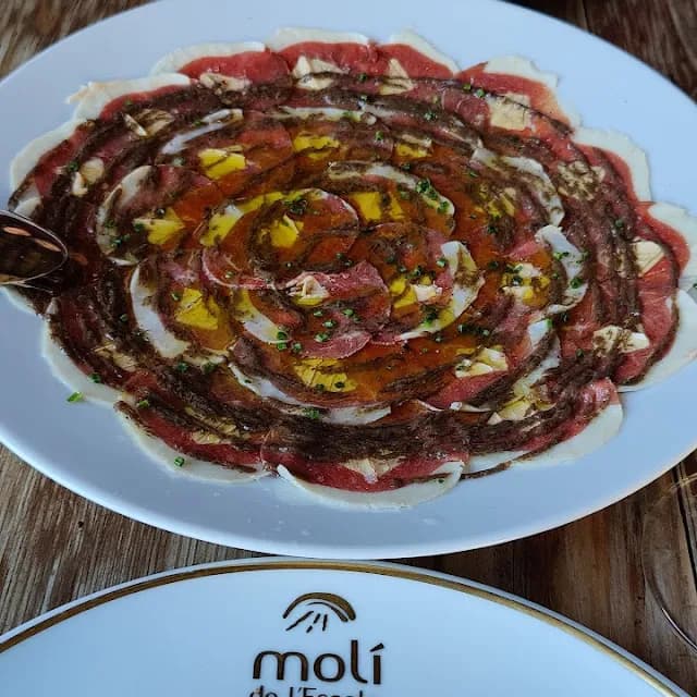 carpaccio de cecina con queso de cabra menu catalan el moli l escala