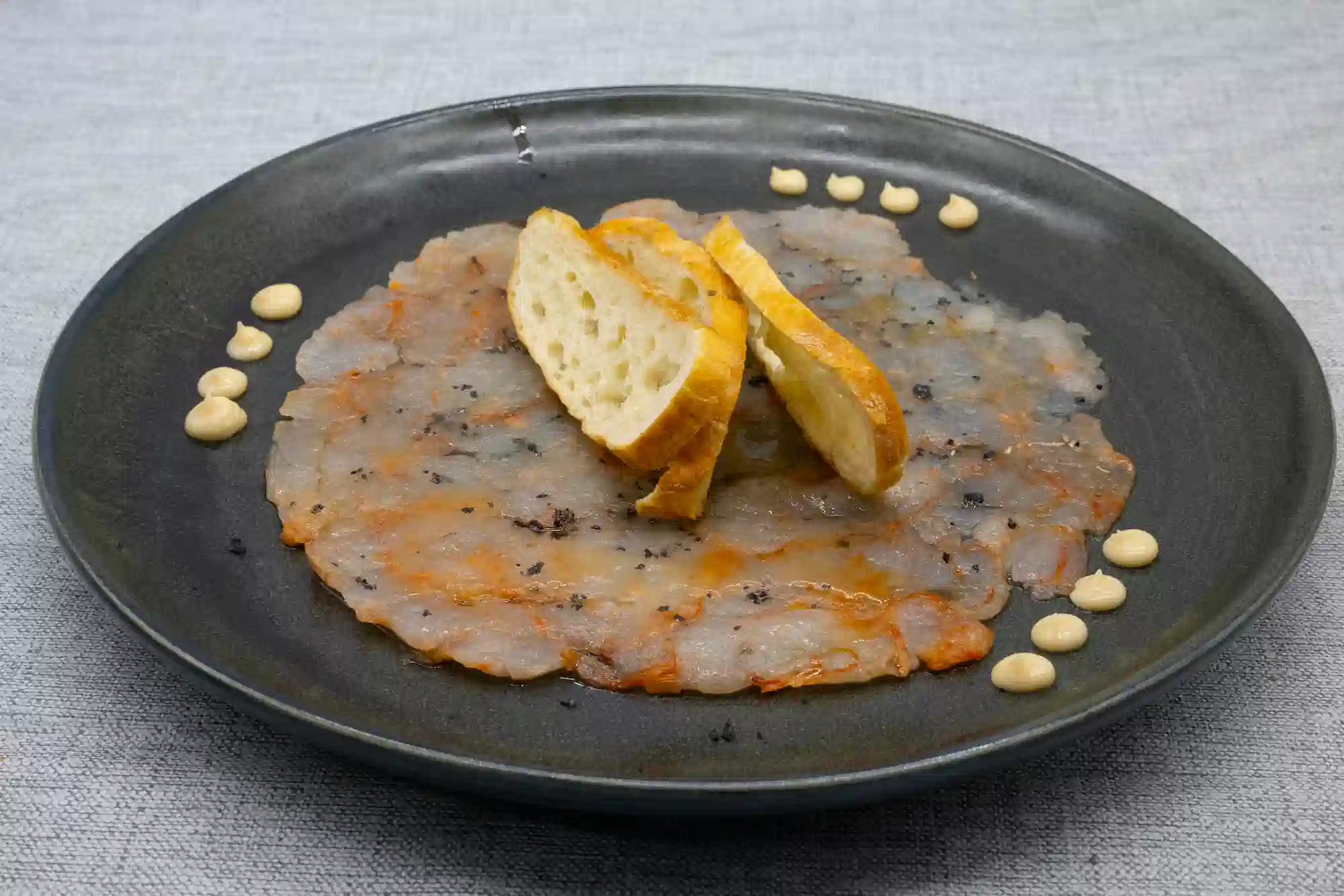 carpaccio de gamba con trufa restaurante menu mediodia figueres aperitivo cocina de autor