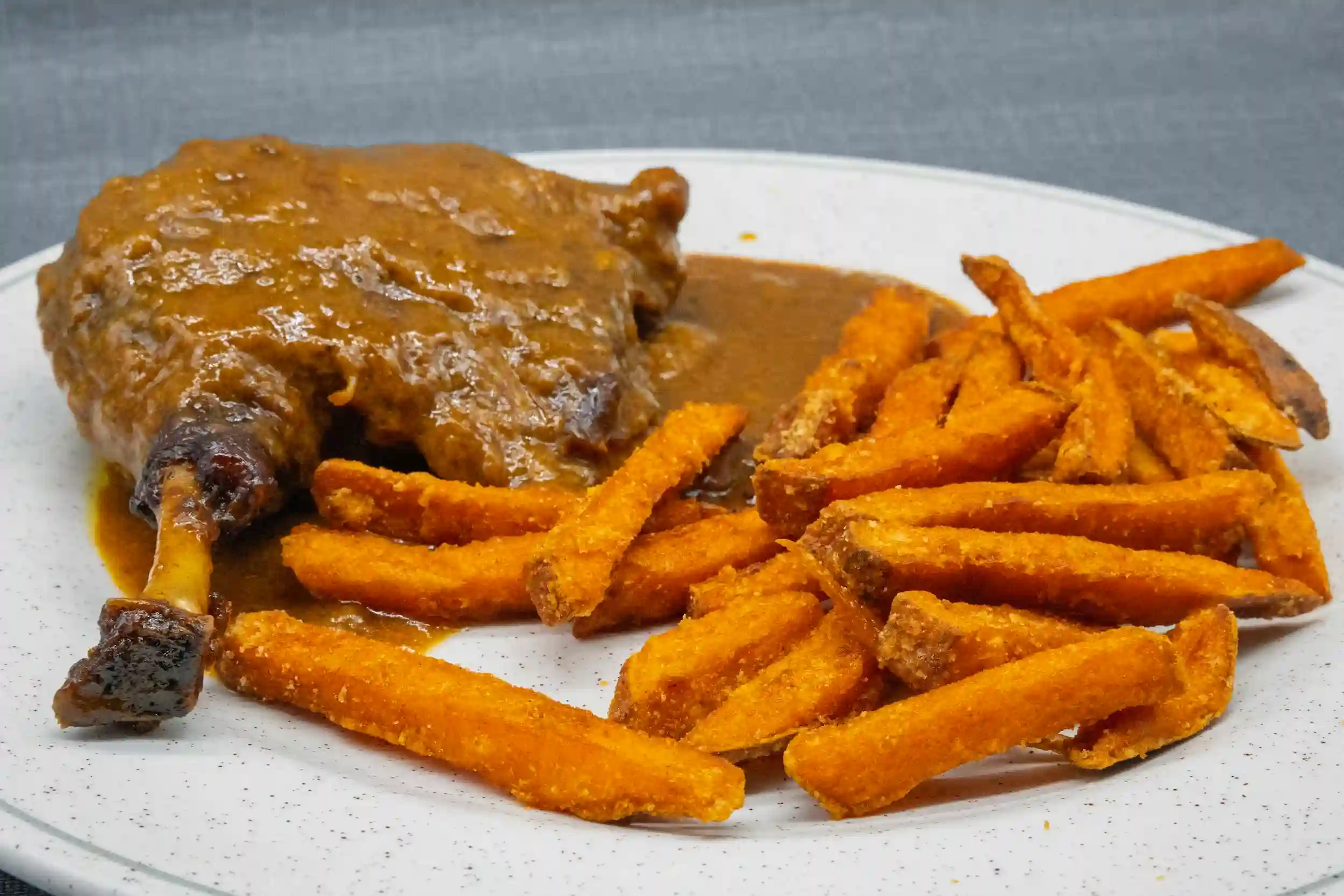 muslo ave boniato vista superior menu mediodia restaurante eixample figueres comida casera